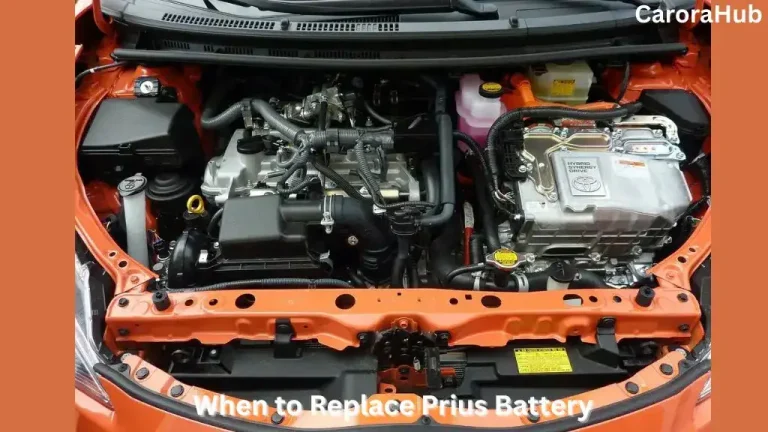 Mechanic checking a Toyota Prius hybrid battery health using a diagnostic tool