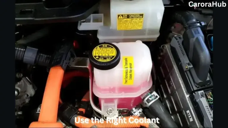 Technician pouring Toyota Super Long Life Coolant into a Prius engine reservoir