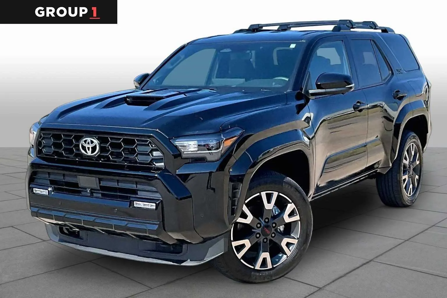 Phone and built-in 4Runner navigation map on a forest road