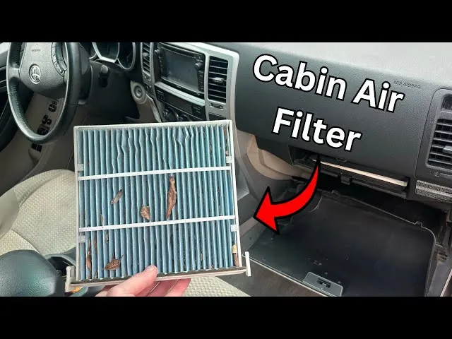 Tools for replacing Toyota 4Runner air filter on a workbench