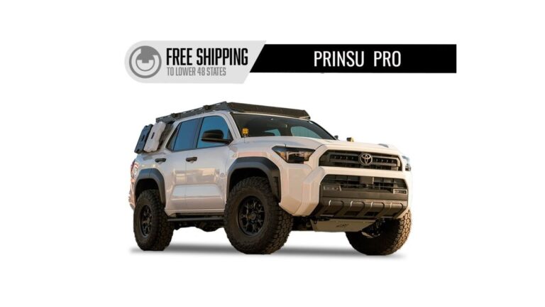 Toyota 4Runner with a loaded roof rack parked on a mountain trail