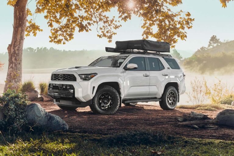 A Toyota 4Runner parked on a driveway equipped with security accessories.