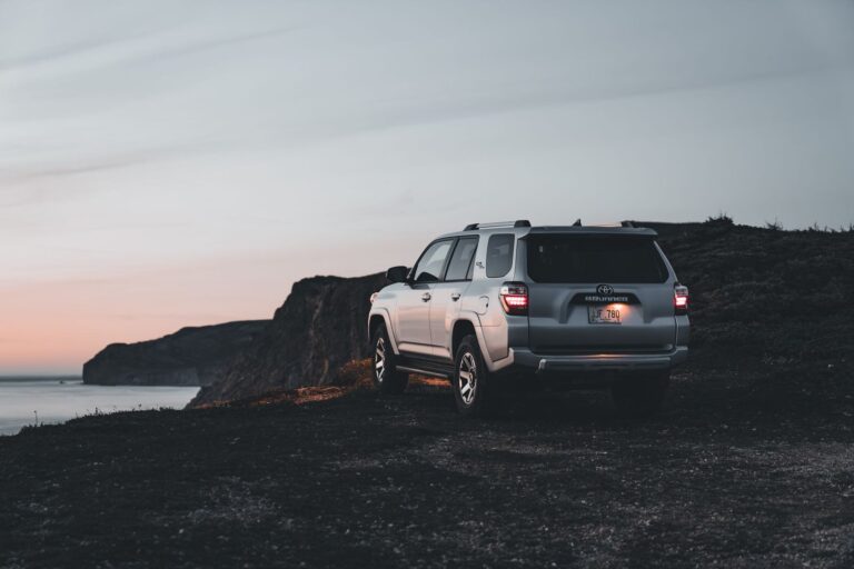 Toyota 4Runner rock sliders mounted on a vehicle in an off-road setting