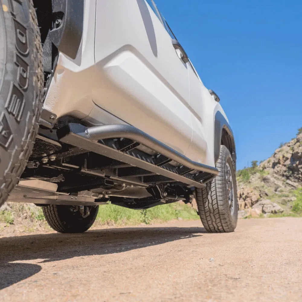 Various Toyota 4Runner rock sliders displayed on a table